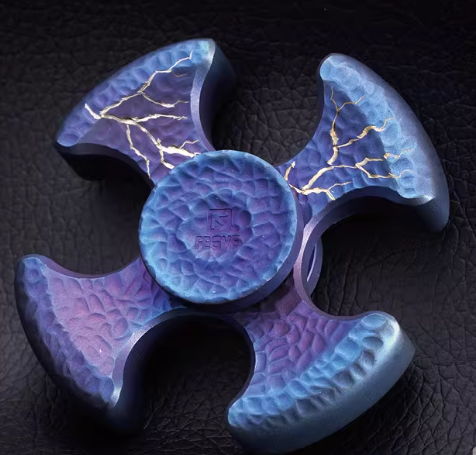 Joy of Rotation: Titanium Fingertip Top